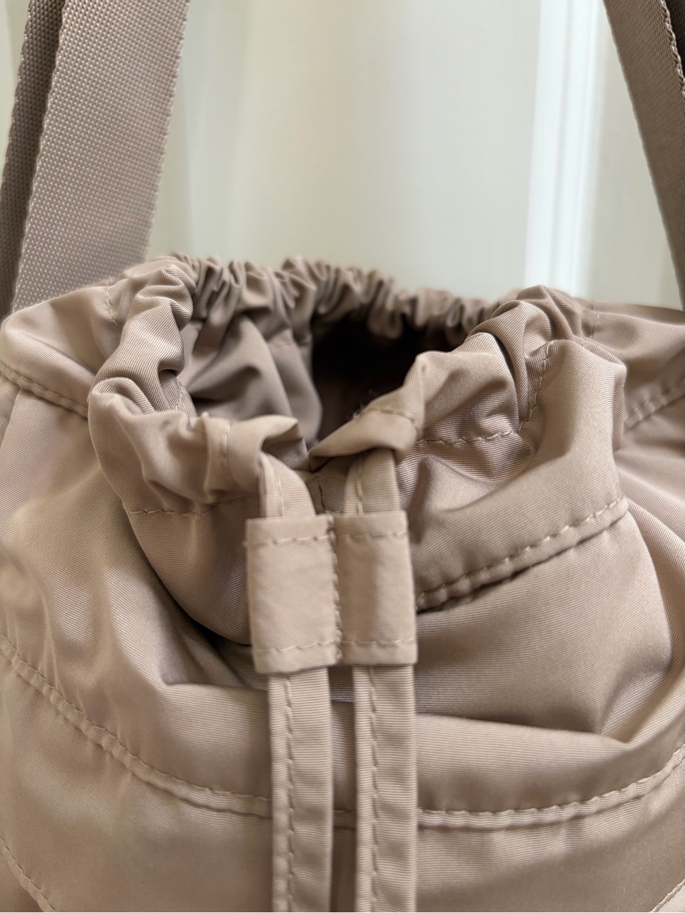 Uniqlo Taupe Drawstring Crossbody Bag - Picture 2 of 8